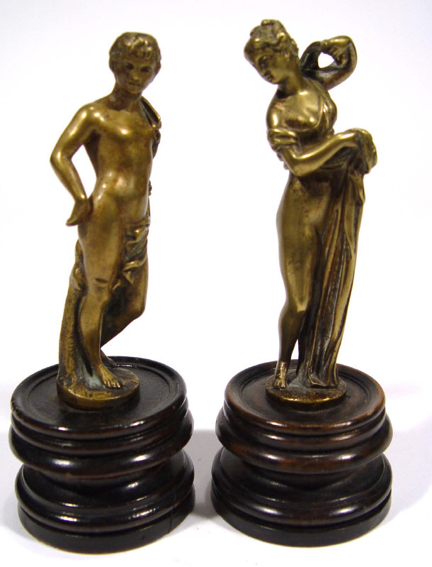 Appraisal: Pair of brass figures on turned harwood bases each cm