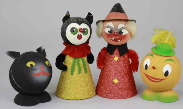 Appraisal: GROUPING OF FOUR HALLOWEEN CANDY CONTAINERS Western Germany includes a