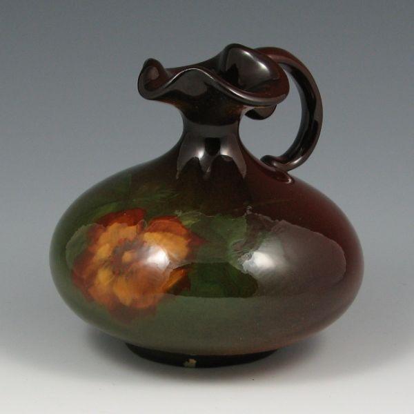 Appraisal: Weller Louwelsa trefoil ewer with open rose decoration Marked Weller