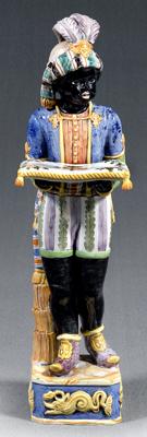 Appraisal: Ceramic blackamoor in two sections wearing turban and holding pillow