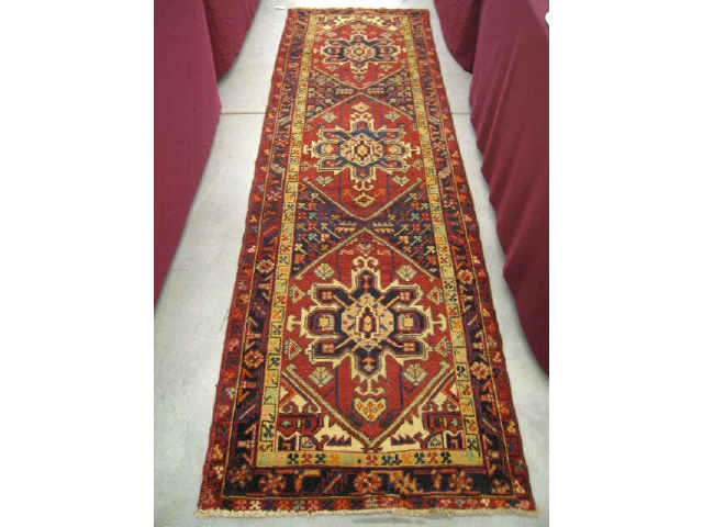 Appraisal: Heriz Persian Handmade Runner triple medallions rich colors ' x