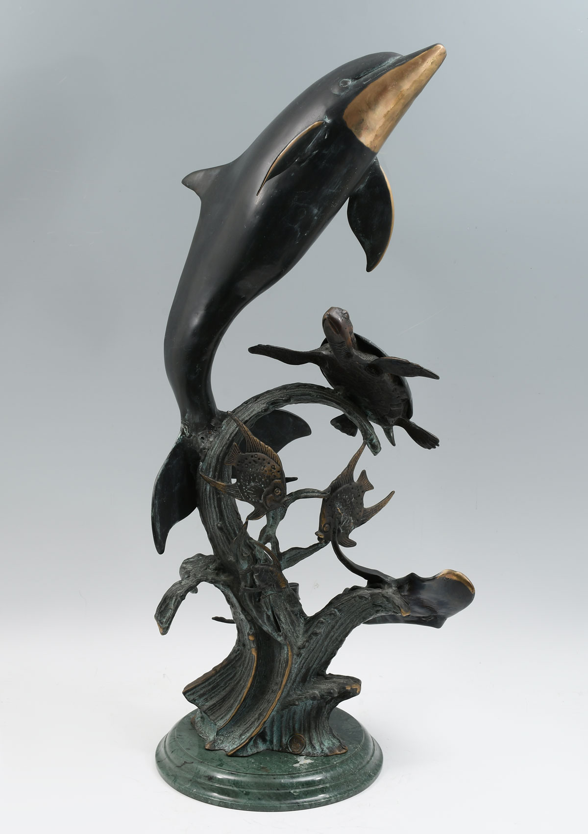 Appraisal: CONTEMPORARY BRONZE SEA LIFE SCULPTURE With dolphin turtle ray and