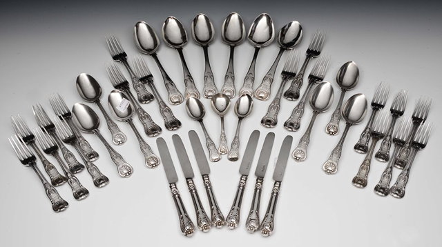 Appraisal: A CANTEEN OF SHELL PATTERN SILVER CUTLERY comprising six dinner