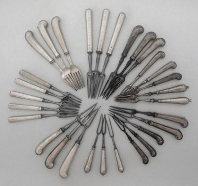 Appraisal: Thirty various table and dessert forks with differing silver handles