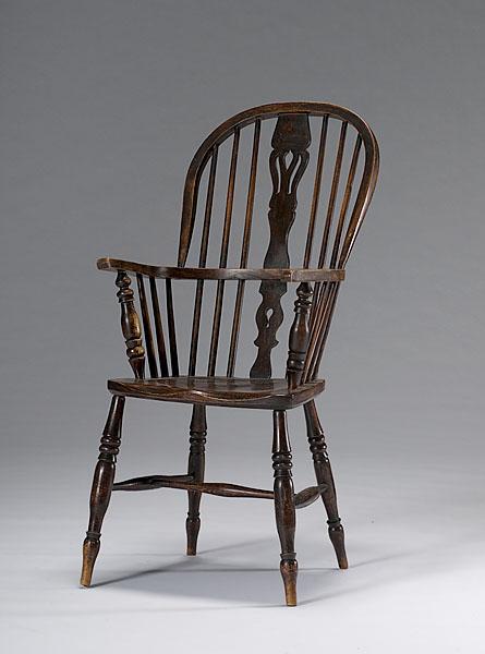 Appraisal: ENGLISH WINDSOR ARM CHAIR th century in oak Bow back