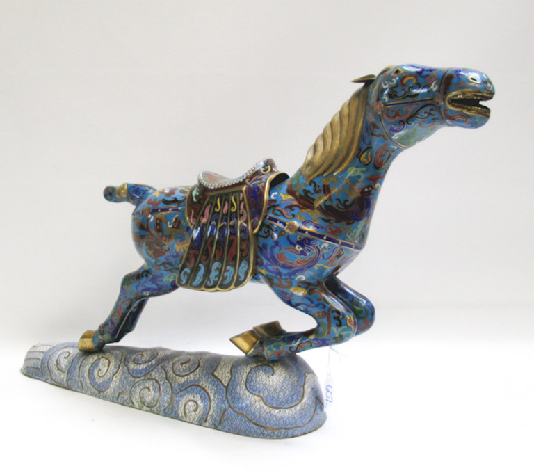 Appraisal: CHINESE CLOISONNE TANG STYLE HORSE The horse having allover colorful