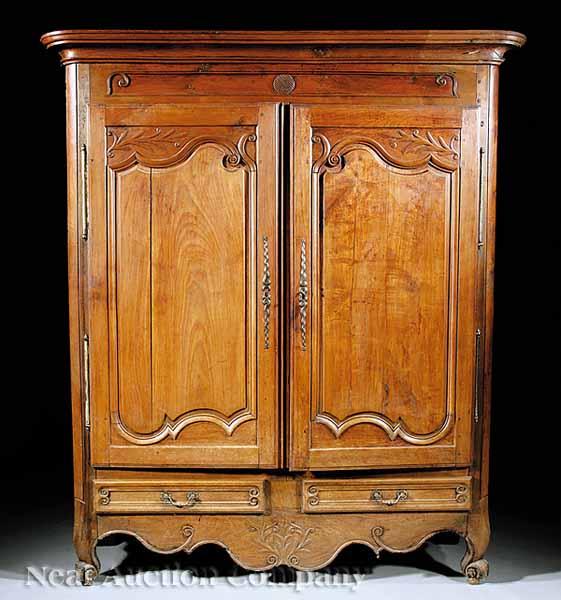 Appraisal: A Louis XV Carved Cherry and Walnut Armoire th c