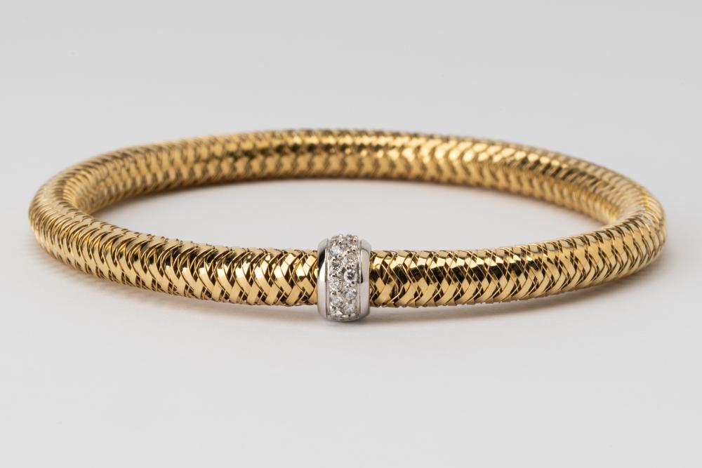 Appraisal: KARAT YELLOW GOLD DIAMOND FLEXIBLE BRACELETConsisting of an endless flexible