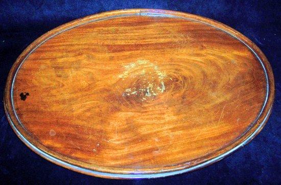 Appraisal: An oval mahogany tray with raised border cm wide