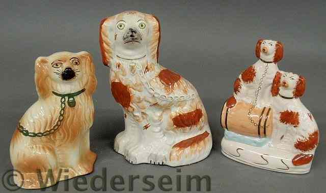 Appraisal: Group of three Staffordshire spaniels largest h