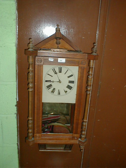 Appraisal: A thC American wall clock with moulded oak case