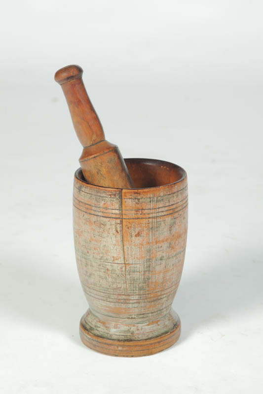 Appraisal: MORTAR AND PESTLE Wooden late th-early th century turned urn