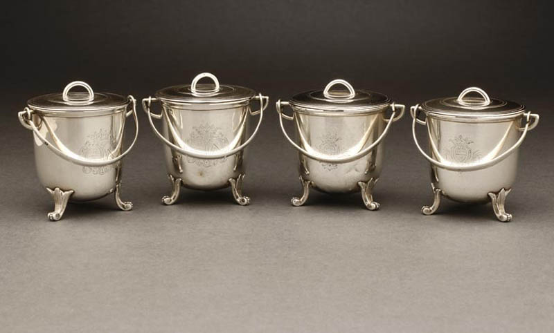 Appraisal: A set of four French silver pots de creme A