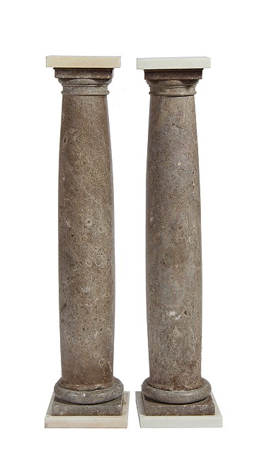 Appraisal: A PAIR OF TURNED GREY MARBLE COLUMNS of slightly bowed