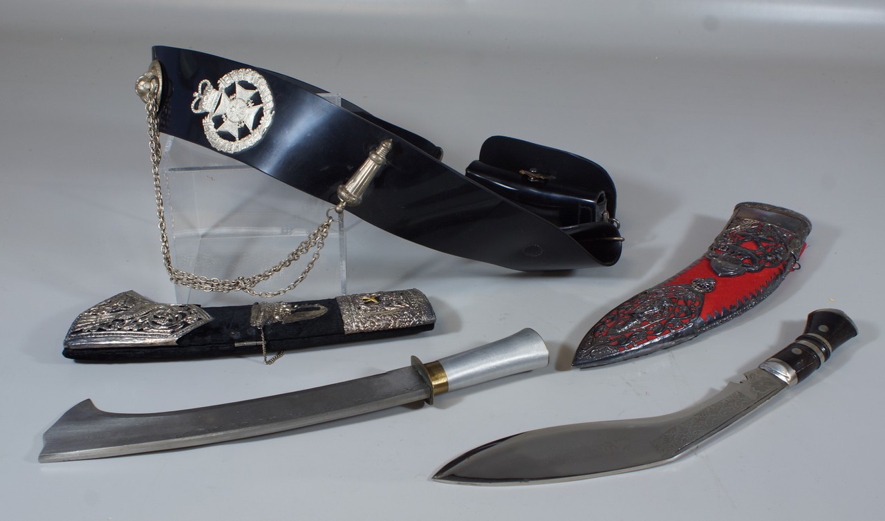 Appraisal: Ghurka Kukri ornate silvered mounts with black leather belt from