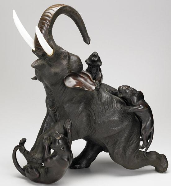 Appraisal: JAPANESE BRONZE ELEPHANT Bull elephant in struggle with three tigers