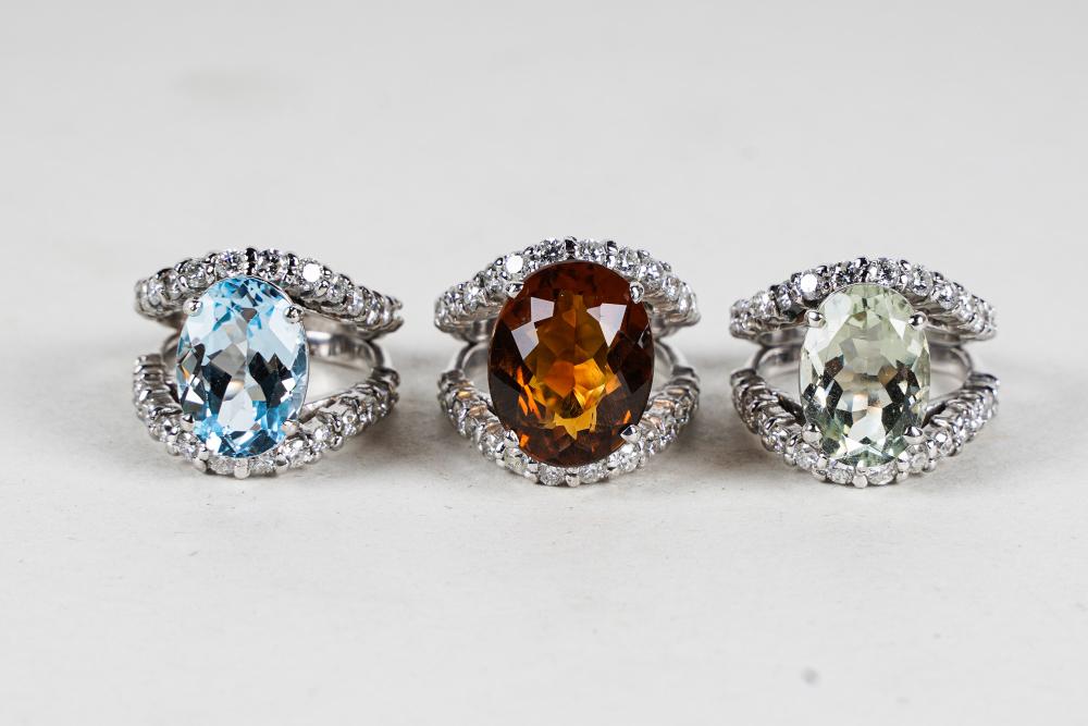 Appraisal: THREE KARAT WHITE GOLD COLORED-STONE DIAMOND RINGScomprising a green quartz