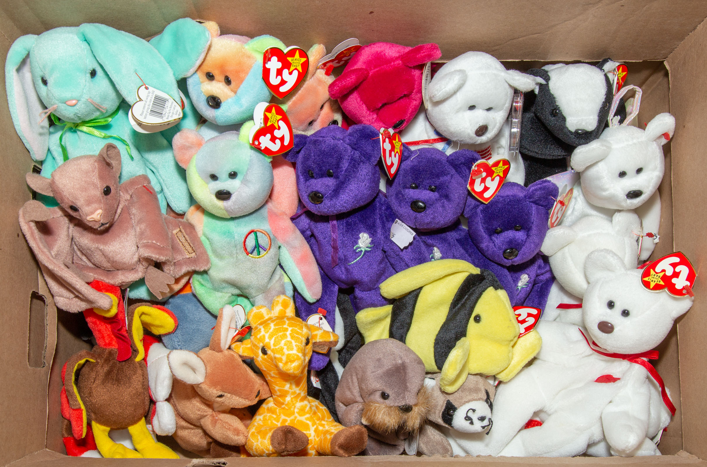 Appraisal: PARADE MAGAZINE'S MOST VALUABLE BEANIE BABIES Includes Peace Bears Pouch