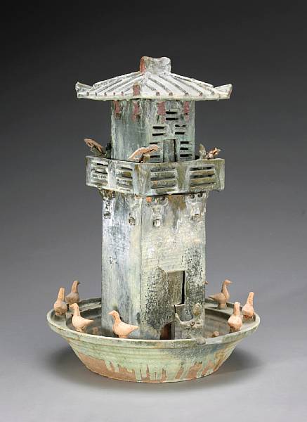 Appraisal: A green-glazed pottery model of a watch tower Han Dynasty