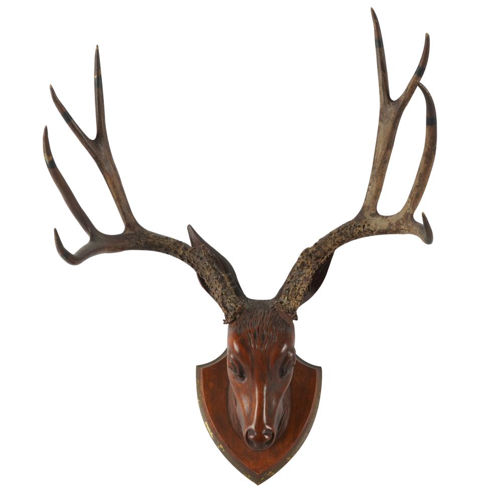 Appraisal: CARVED BUCK'S HEAD MOUNTcarved wood and antler Provenance The Estate