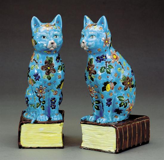 Appraisal: Pair Chinese porcelain bookends cat form perched on book decorated