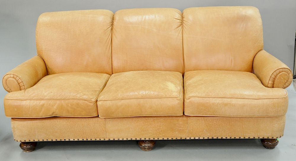 Appraisal: Leather upholstered sofa lg in and easy chair Leather upholstered