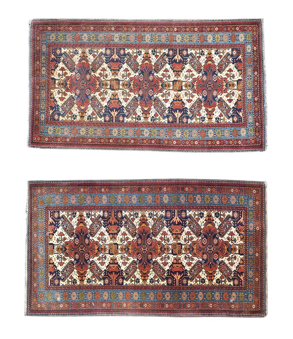 Appraisal: Pair of rectangular Seychelles carpets with central designs and matching