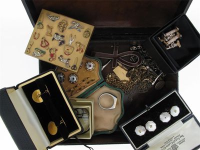 Appraisal: A box containing assorted cufflinks chains and costume jewellery