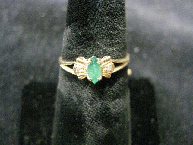 Appraisal: Emerald Diamond Ring marquis emerald with small diamond on each