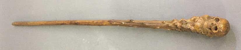 Appraisal: Walking Stick with Carved Skull Handle Walking stick with a