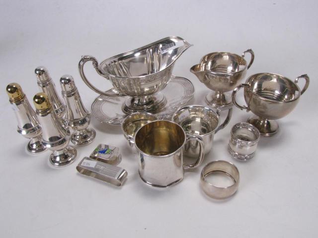 Appraisal: Group of sterling silver table accessories including embossed gravy boat