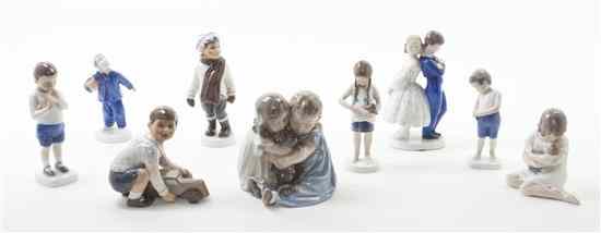 Appraisal: A Collection of Nine Danish Porcelain Figures comprising five Bing