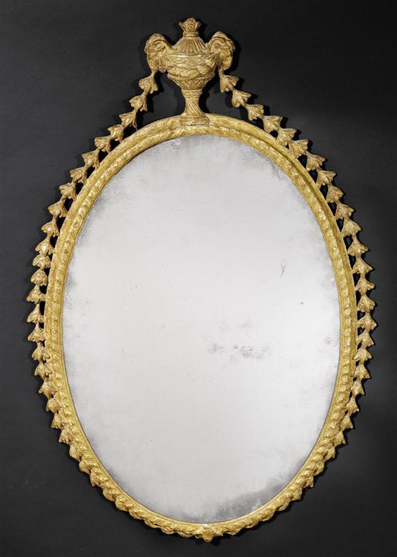 Appraisal: PAIR OF OVAL MIRRORS AUX TETES DE BELIERS late Louis