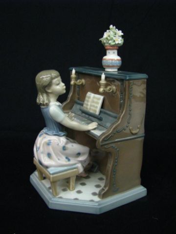 Appraisal: Lladro Practice Makes Perfect figurine depicting young female pianist