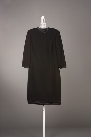 Appraisal: CHADO black wool dress w black satin trim on cuffs