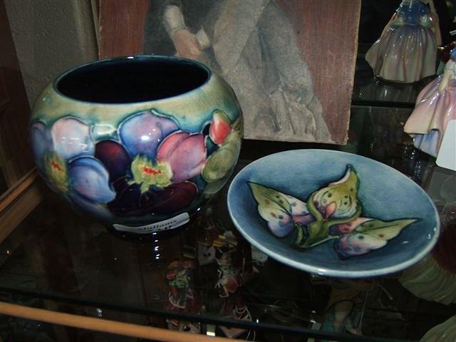 Appraisal: A blue and green glazed Moorcroft vase decorated with anemones