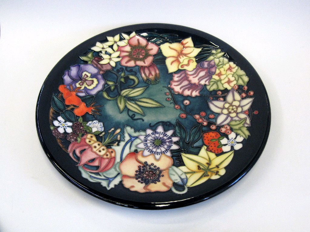 Appraisal: Moorcroft Carousel pattern charger designed by Rachel Bishop to celebrate