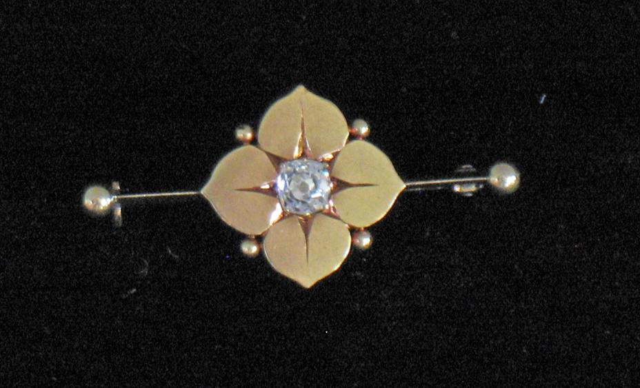 Appraisal: A DIAMOND-SET BAR BROOCH the central round old-cut diamond circa