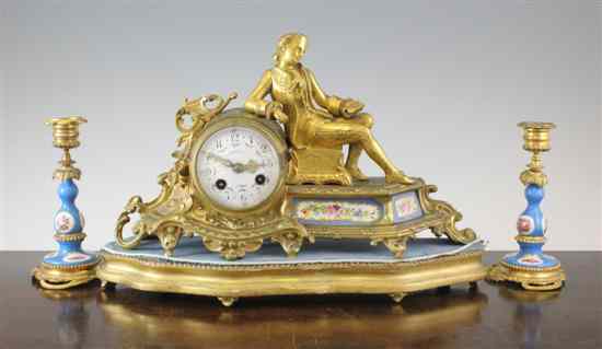 Appraisal: A th century French ormolu and porcelain mantel clock surmounted