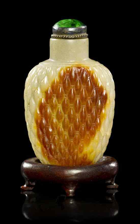 Appraisal: A Chinese Jade Simulated Basketweave Carved Snuff Bottle of mottled