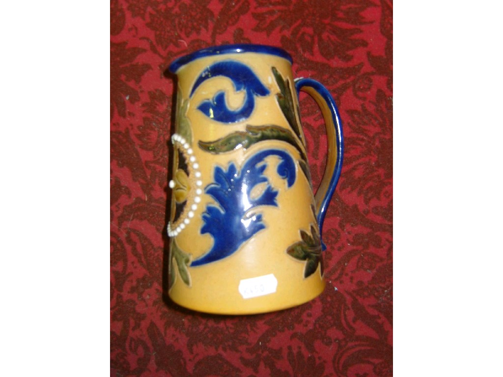 Appraisal: A late th century stoneware jug with incised and painted