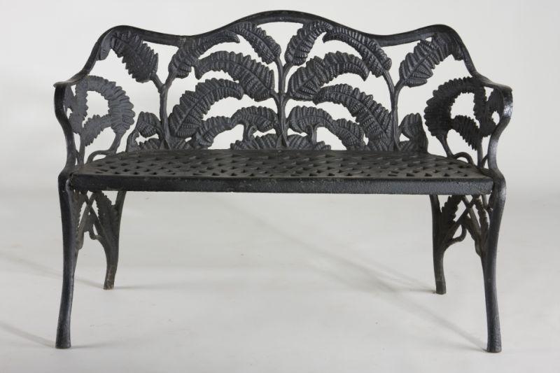 Appraisal: Architectural Garden Bench th c cast iron shaped back with