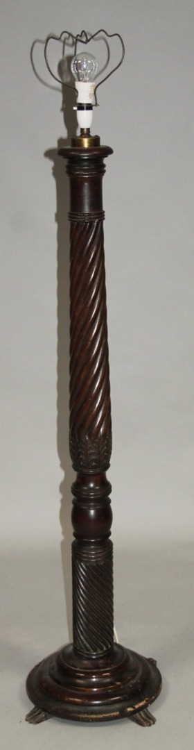 Appraisal: A late thC mahogany torchere the cylindrical ropetwist stem with