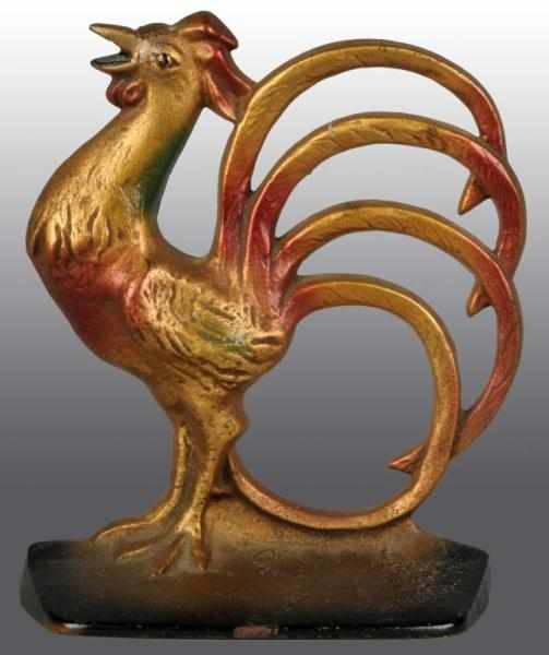 Appraisal: Cast Iron Rooster with Fantail Doorstop Description Creations Co Copyright