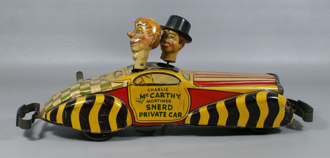 Appraisal: Tin lithograph Charlie McCarthy and Mortimer Snerd Private Car Louis