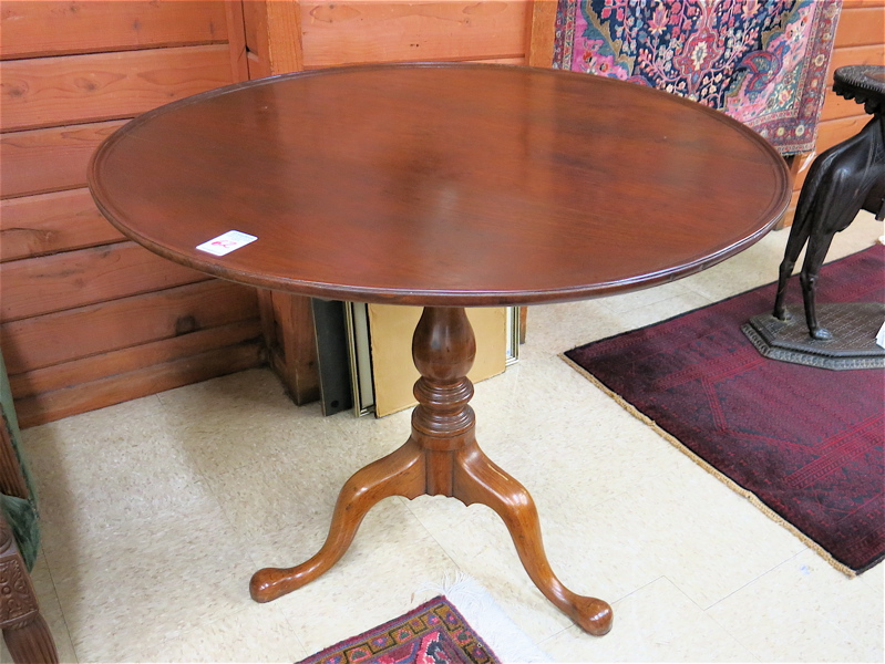 Appraisal: A ROUND TILT-TOP TEA TABLE American th century the round