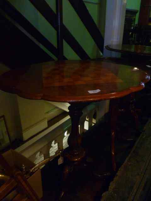 Appraisal: A VICTORIAN MAHOGANY GAMES TABLE with inlaid chequered board top