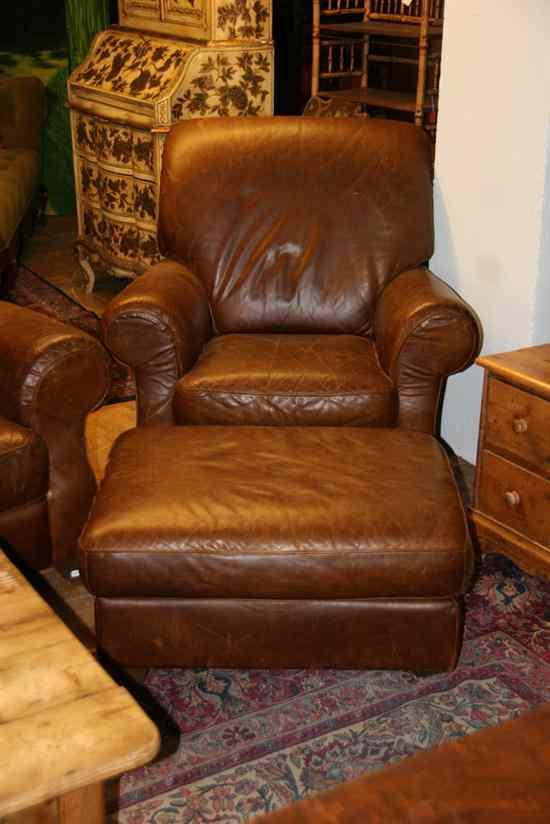 Appraisal: CONTEMPORARY BROWN LEATHER ARM CHAIR AND MATCHING OTTOMAN - Chair