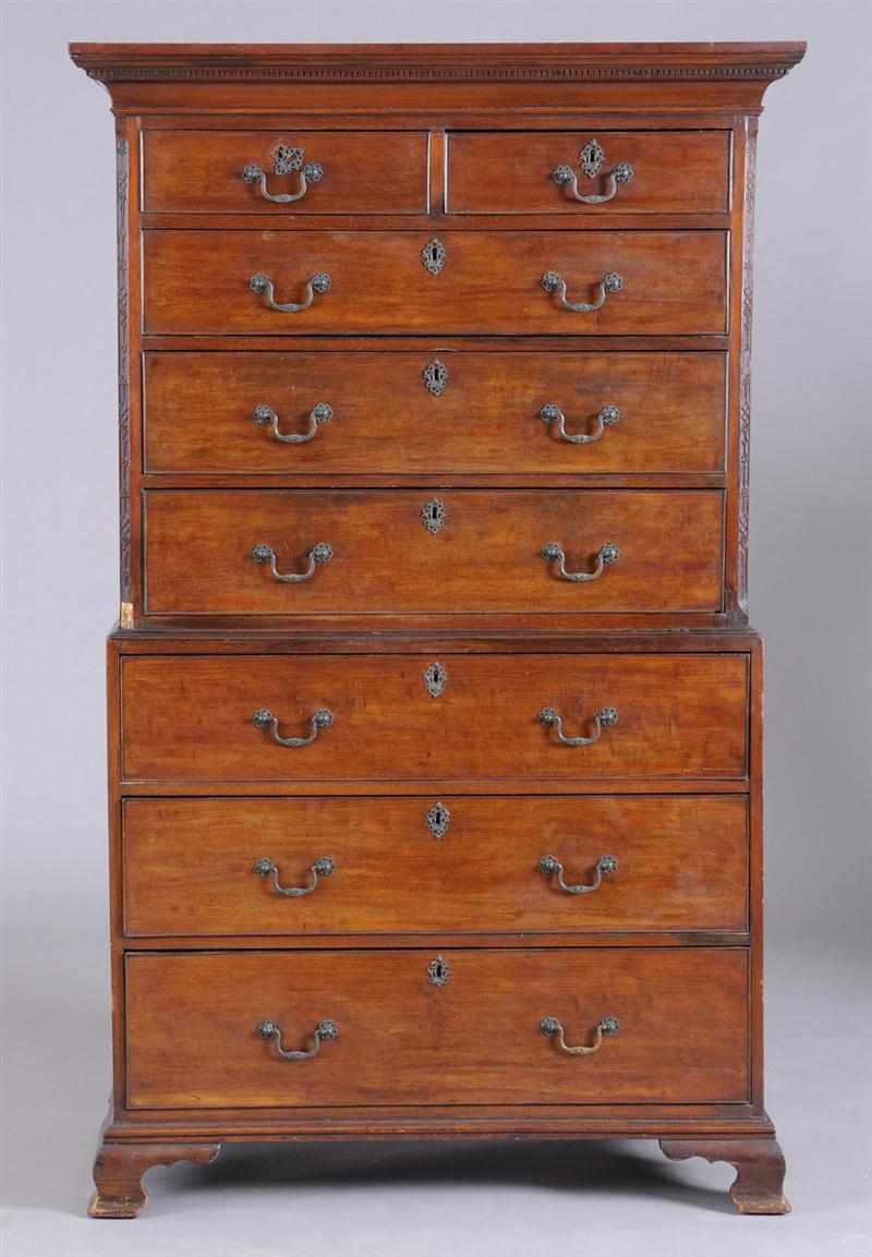 Appraisal: GEORGE III MAHOGANY CHEST-ON-CHEST The denticulated cornice above two short