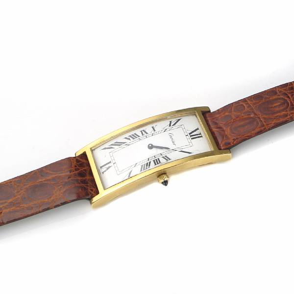 Appraisal: A metal rectangular wristwatch curved case with strap